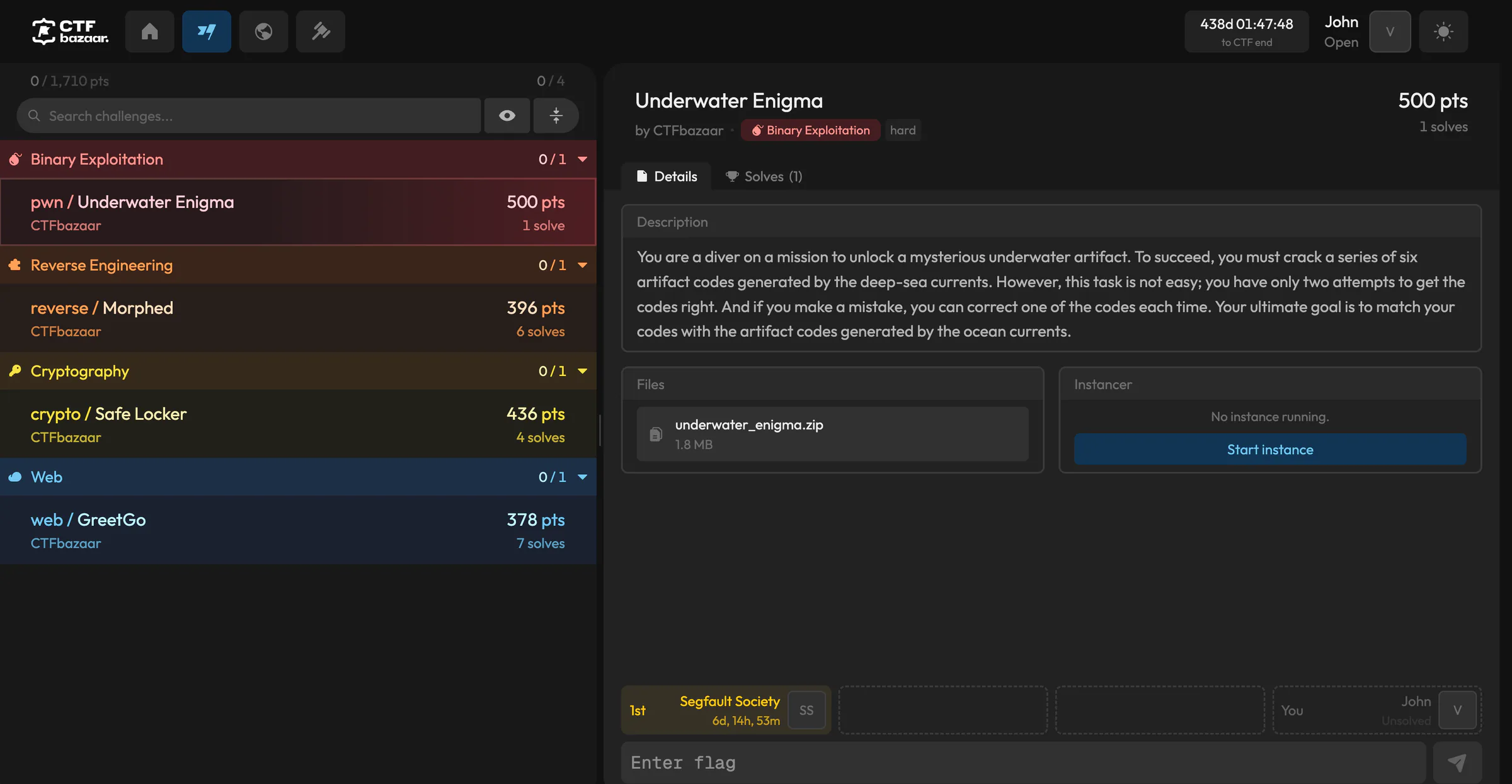 The CTF challenge view: challenges grouped by category with points and solves on the left, and the selected Underwater Enigma challenge with its description, files, instancer and flag input on the right.